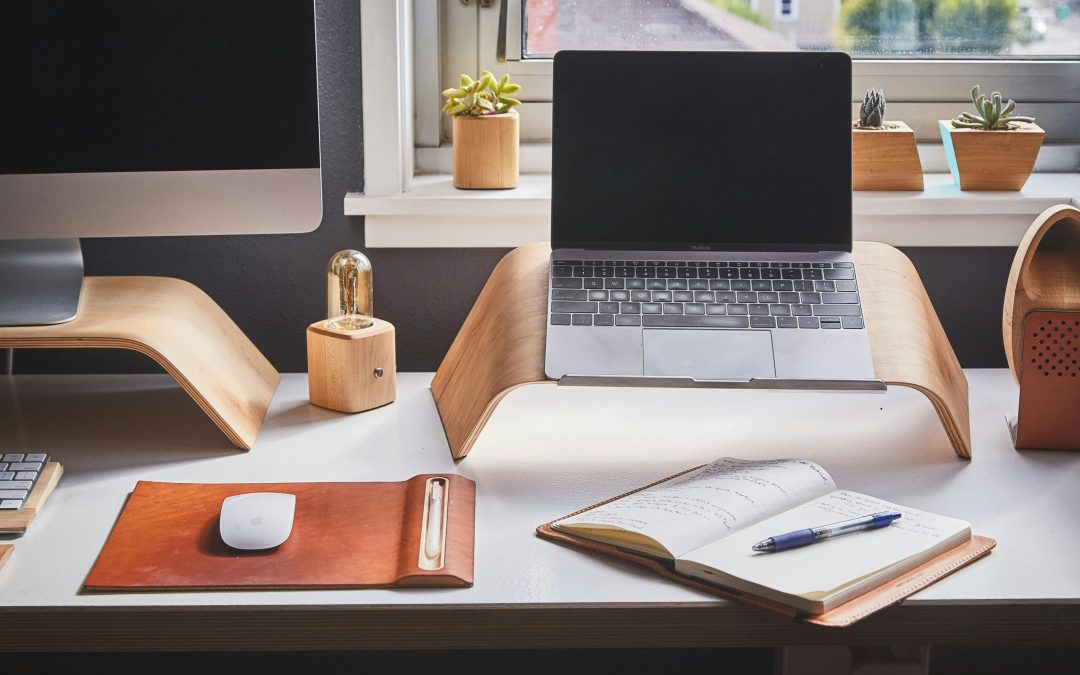 Free A stylish and contemporary home office setup with laptop and desk accessories. Stock Photo